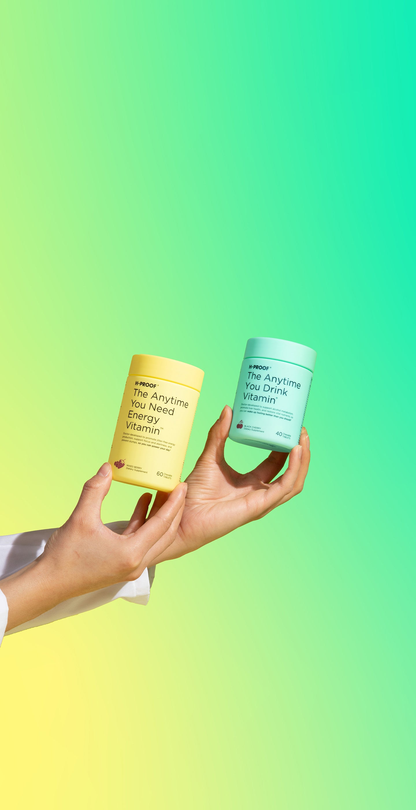 Doctor's hands holding H-Proof Energy Vitamin and H-Proof Drink Vitamin