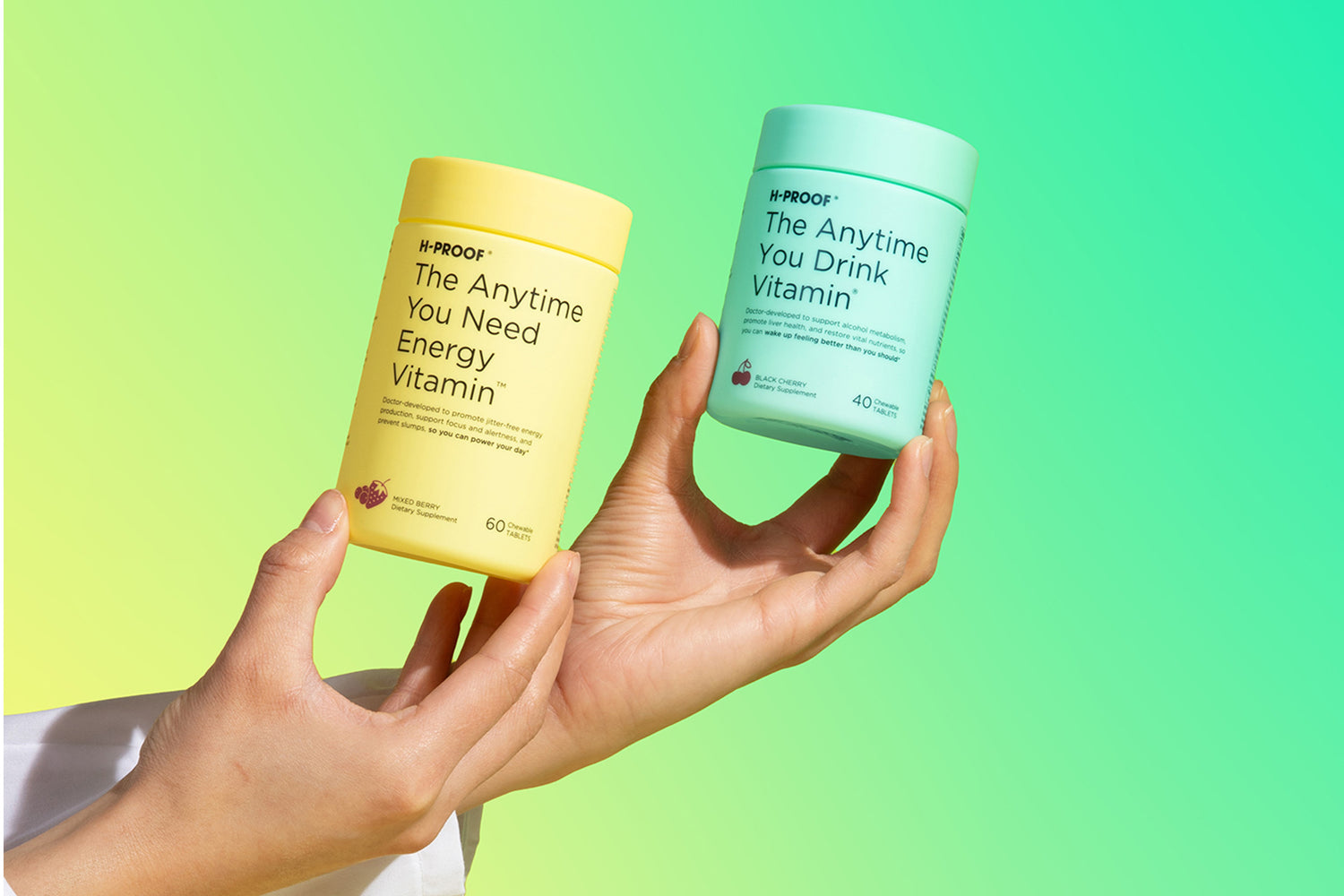 Doctor's hands holding H-Proof Energy Vitamin and H-Proof Drink Vitamin